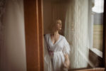 Sposa riflesso durante preparazione matrimonio Fortezza Santo Spirito